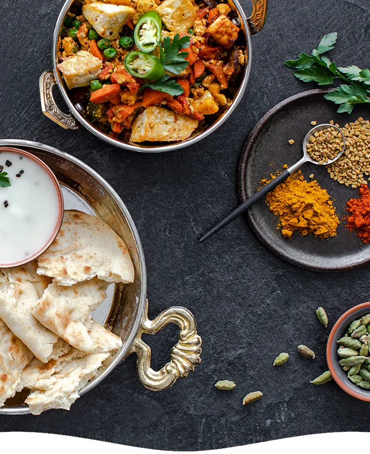 Tomato Vegetable Curry with Cardamom Yogurt